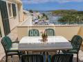 Chalet con impresionantes vistas sobre el puerto de Addaia y la espectacular costa escarpada que se extiende hasta el horizonte, Menorca