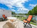 Spacious apartment on the water's edge in Cala Moli, Menorca