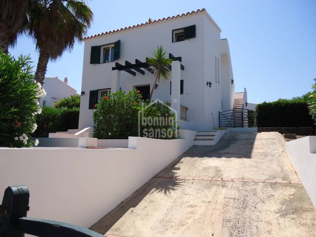 A detached villa with gardens and  pool, in  Addaya harbour, Menorca