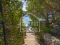 House on the seafront at Binisafua Playa, Menorca