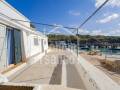 House on the seafront at Binisafua Playa, Menorca