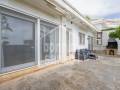 Bonito apartamento con terraza, jardín, dos parkings y vistas al mar en Coves Noves, Es Mercadal. Menorca.
