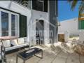 Bel appartement duplex entièrement rénové à quelques minutes de la plage de Santandria, Menorca