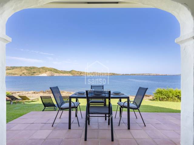 Fantastic ground-floor apartment located on the seafront in the exclusive residential area of Playas de Fornells, Menorca.