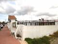 Grande opportunité d’investissement ! Propriété offrant de multiples possibilités de rénovation dans un cadre privilégié à Los Delfines, Ciutadella de Minorque