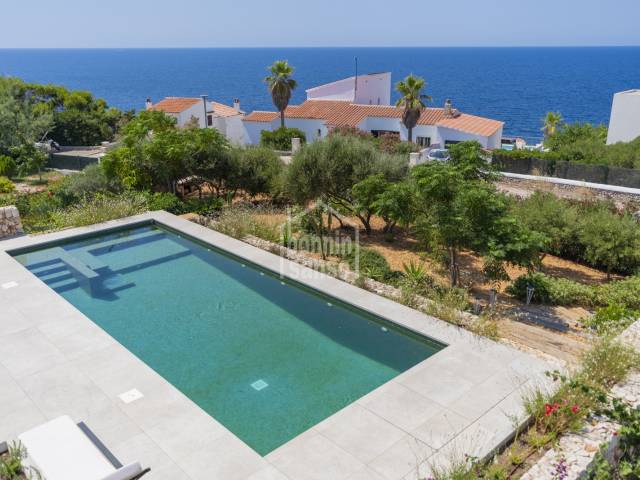 Contemporary designer villa with panoramic Mediterranean views, Cala Canutells, Menorca.