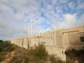Terreno rústico con edificaciones destinadas a establos. Sant Lluís - Menorca