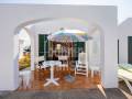 Chalet con piscina in comune in seconda linea sul mare a Cala Blanca, Ciutadella, Minorca