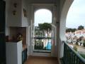 Apartamento en primera planta con jardines y piscina comunitarios en Addaya, Menorca