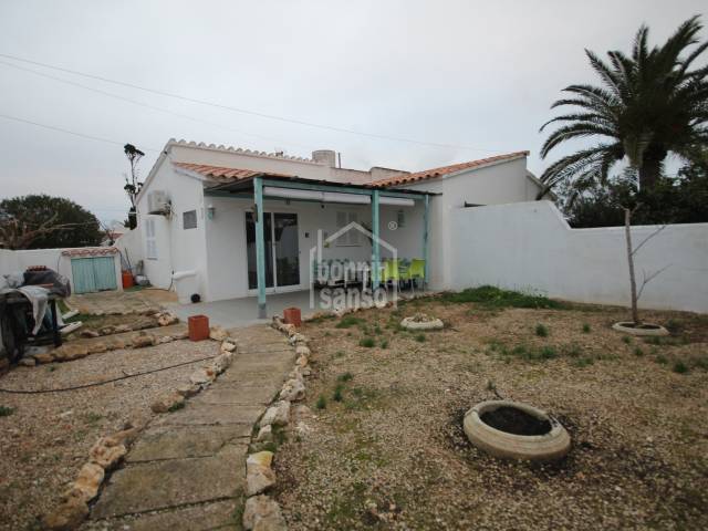 Semi-detached villa with communal pool in Calan Porter, Menorca