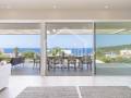 Villa de diseño contemporáneo con vistas panorámicas al Mediterráneo, Cala Canutells, Menorca.