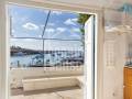 House on the seafront at Binisafua Playa, Menorca
