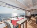 Restaurant amb vistes al mar a Cala Torret, Menorca